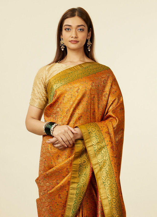 alt message - Mohey Women Mustard Yellow Bel Buti Patterned Saree with Trim Latkans image number 1